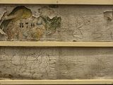 a picture of a wooden box with a painting on it