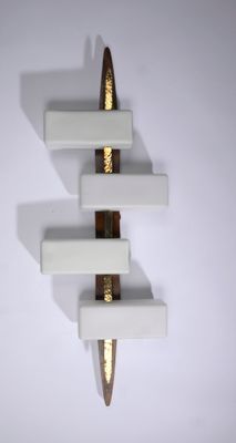 a picture of a wall mounted shelf with a knife on top of it