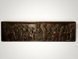 une plaque en bronze représentant le baptême de Jésus et de sa famille