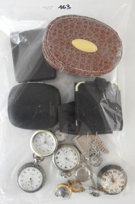 a bag of assorted watches and other items in it