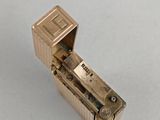 a small lighter that is sitting on a table