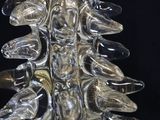 a glass christmas tree that is made out of glass