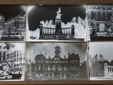 several black and white photos of old buildings in a wooden frame