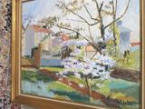 une image d'un tableau accroché au mur d'une pièce