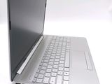 a laptop that is sitting on a white surface