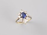 a sapphire and diamond cluster ring