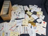 a box full of tickets and other items on a table