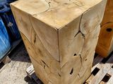 several pieces of wood stacked on top of a pallet in a yard
