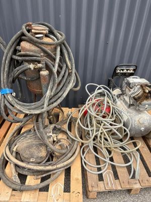 a pile of wires and a hose on a pallet