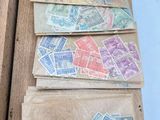 many different types of stamps on a piece of wood