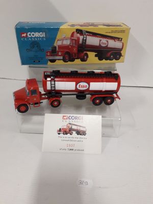 a red truck and a red truck with a box on the back