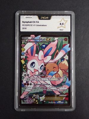 a close up of a card in a plastic case on a table