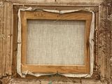 an old wooden picture frame with a piece of paper taped around it
