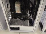 a white computer case sitting on top of a table
