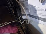 a cell phone and a pair of glasses on a desk