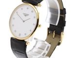 a close up of a wrist watch with a white dial and black leather strap