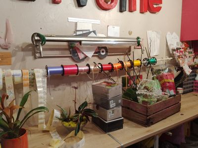 a wooden table with a bunch of different items on it