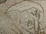 an old map of the country of france with mountains in the background