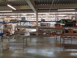 a large warehouse filled with lots of boxes and shelves