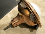 a lamp that is on a wooden floor in a room