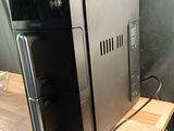 an image of a coffee machine on a wooden table