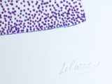 a picture of a piece of paper with purple spots on it
