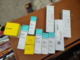 a table with a bunch of boxes of cigarettes on it