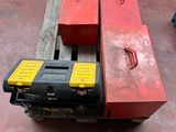 two tools on a pallet on the floor