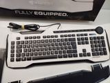 a computer keyboard and mouse sitting on a desk