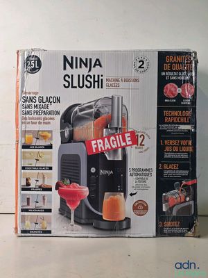 a box with a picture of a juicer inside of it