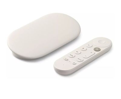 une télécommande posée à côté d'un objet blanc