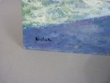 a picture of a painting on a table that is on display