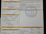 an image of a close up of a document with a barcode on it