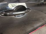 a close up of a door handle on a car