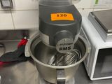a mixer and a blender sitting on a kitchen counter
