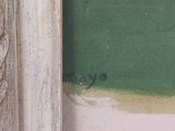 une image d'un tableau sur le mur d'un bâtiment