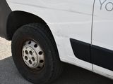 a white van that has a sticker on the side of it