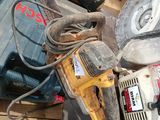 a pile of tools that are sitting on the floor