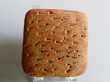 a piece of bread that is sitting on top of a piece of plastic