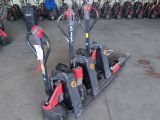 many different types of electric scooters in a garage