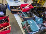 a table with many tools on it in a room