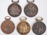 six antique pocket watches with gold and silver decorations on them