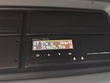 the dashboard of a car with a digital display on it
