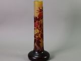 a picture of a vase with a flower design on it