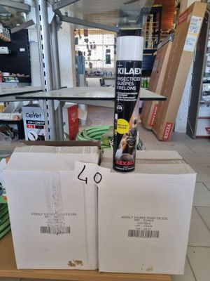 two boxes of beer sitting on a table in a store