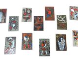 many pieces of art that are on the table