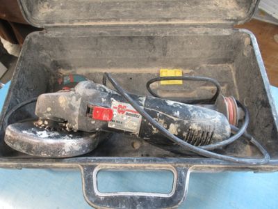 a tool in a case that is sitting on a table