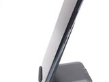a cell phone that is sitting on top of a stand