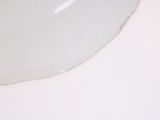 a white sink with a white bowl on top of it