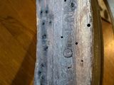 a close up view of a piece of wood on a table